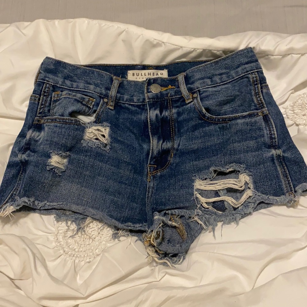 Ripped blue Jean shorts from bullhead denim co.